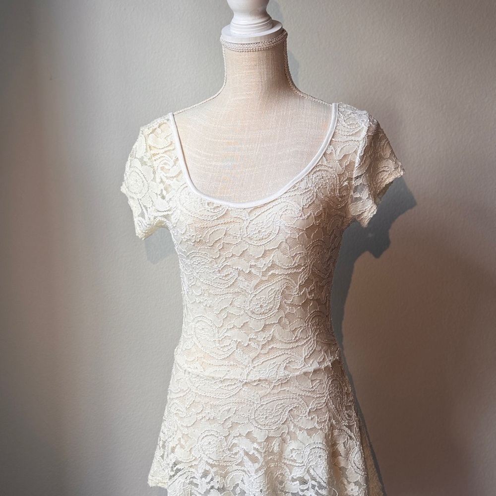Ivory Lace Peplum Top with Open Back Detail - Size Small
